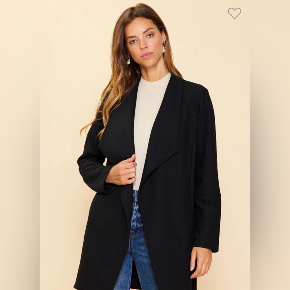 Black medium weight quilted jacket with pockets worn once